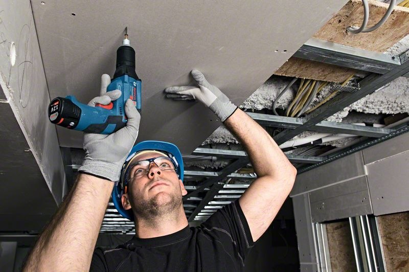 Schrauben, Schrauber, Bau, Trockenbau, Arbeitshandschuhe