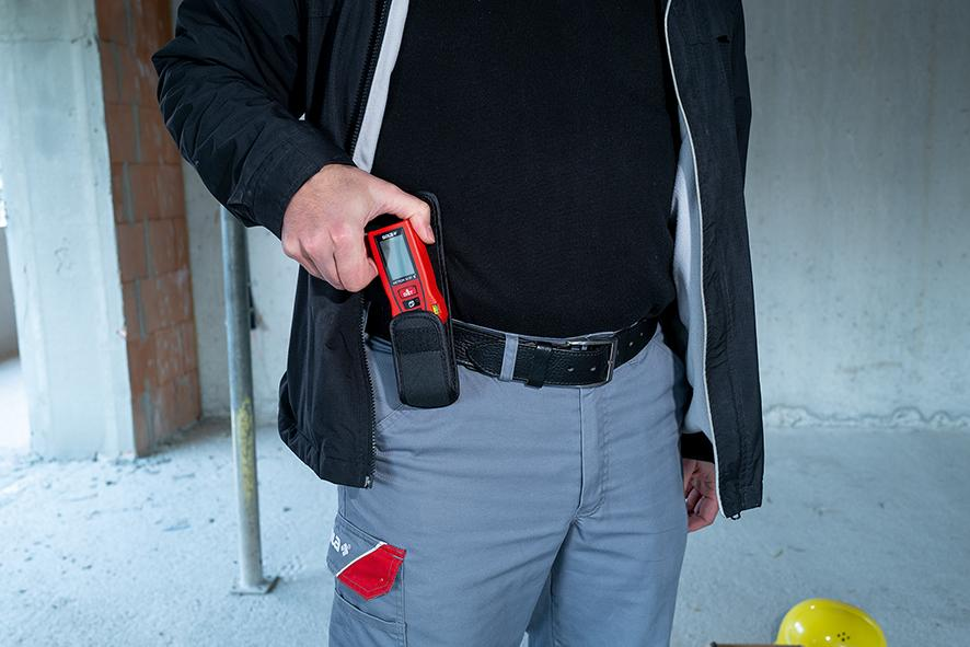 Messgerät, Rotes Handgerät, Elektronik, Gürtel-Taschenwerkzeug, Arbeitskleidung