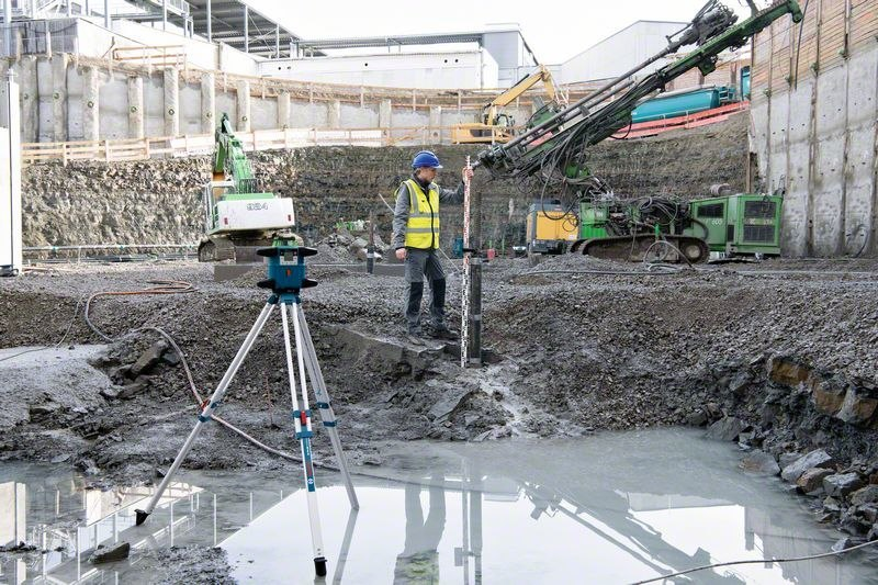 Bauarbeiter, Baustelle, Messgerät, Vermessung, Hydraulikbagger